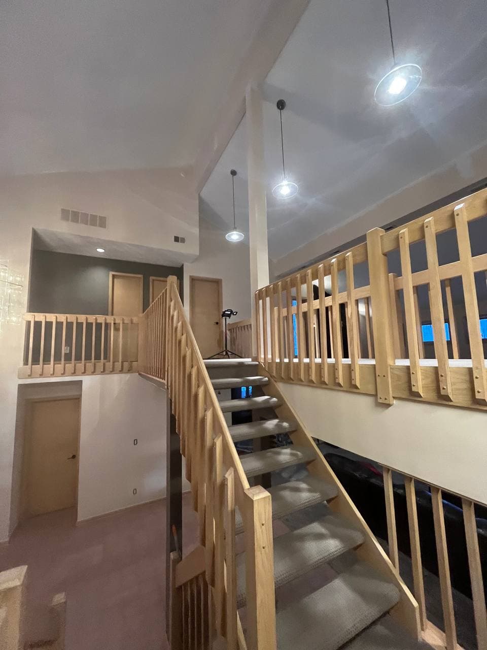 Finished stairwell and upper landing with fresh paint